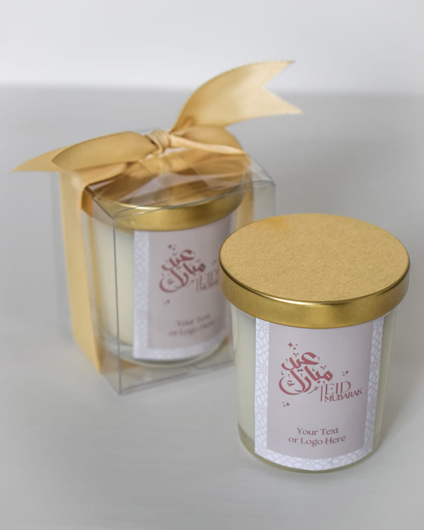 Two candles with gold lids and labels Eid Mubarak Gifts Favors Scented Candle